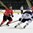 GRAND FORKS, NORTH DAKOTA - APRIL 19: Canada's William Bitten #14 dumps the puck past Finland's Miro Heiskanen #33 during preliminary round action at the 2016 IIHF Ice Hockey U18 World Championship. (Photo by Minas Panagiotakis/HHOF-IIHF Images)

